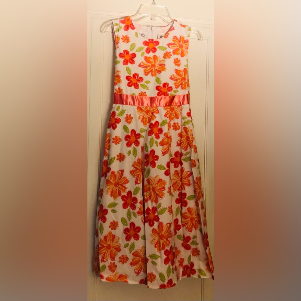 Cute, fun flowery dress for spring/summer wear.
